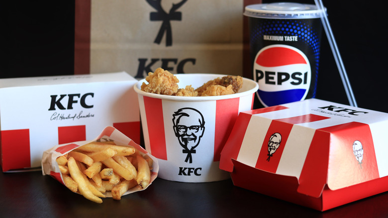 Bucket of KFC chicken, fries, and drink