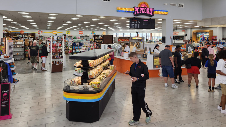 Customers shopping inside Wally's store