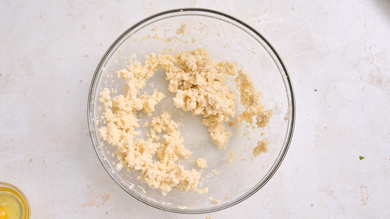 butter and sugar combined in a bowl