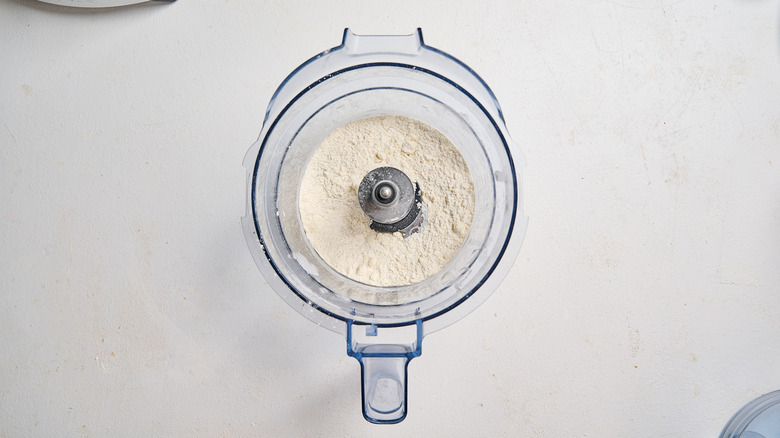 butter pulsed into pea sized pieces in food processor