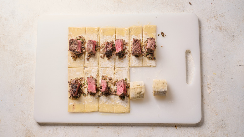 wrapping beef in puff pastry