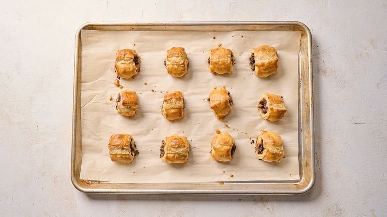 baked puff pastry bites on a sheet tray