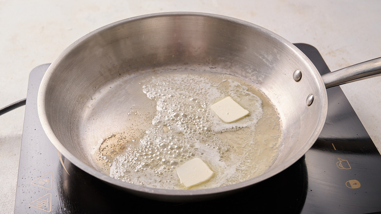 melting butter in a skillet
