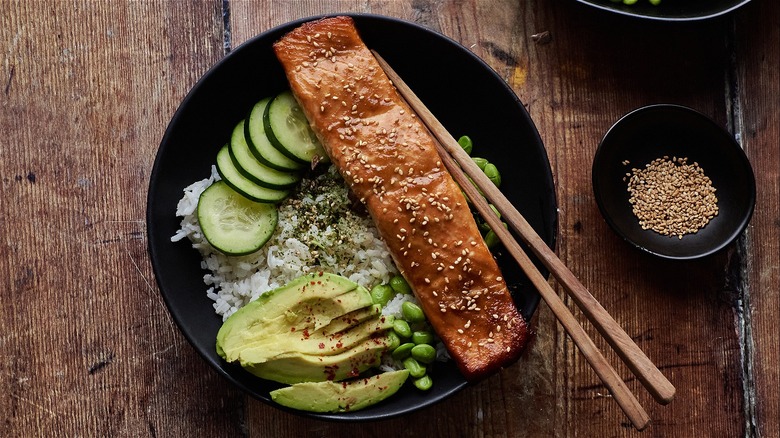 teriyaki salmon in rice bowl