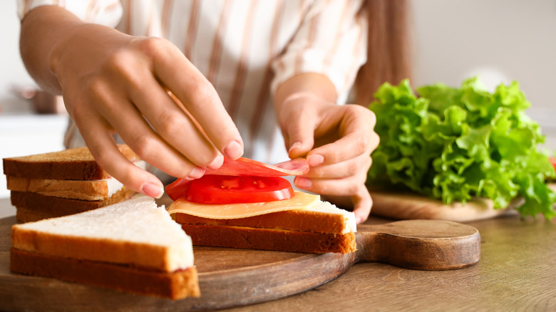 person making a sandwich