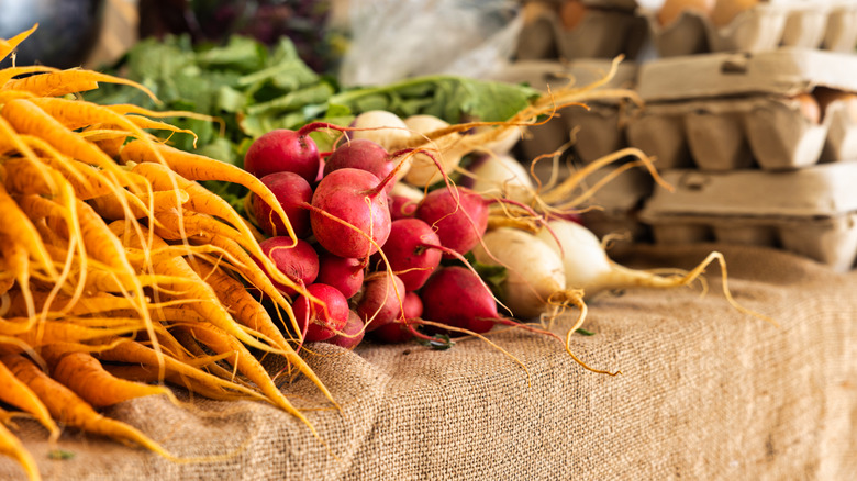 Various produce at farmers market stall