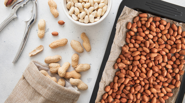overhead view of raw and roasted peanuts