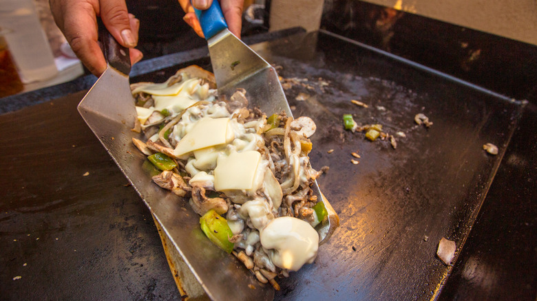Making a Philly cheesesteak