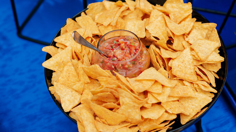 bowl or tortilla chips with salsa