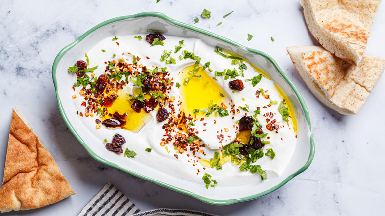 marscarpone spread with herbs and oil with pita bread