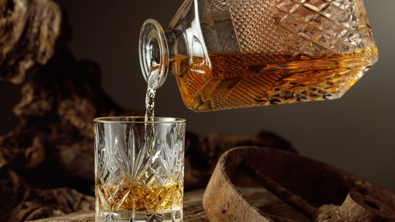 Whiskey poured into glass