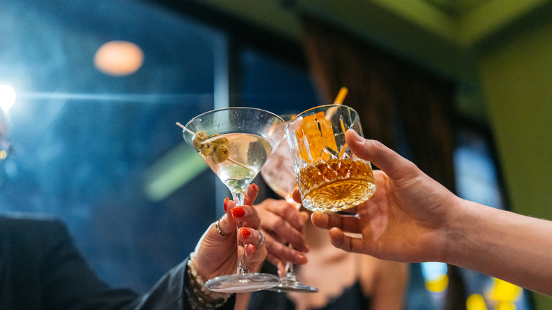 toasting with cocktail glasses