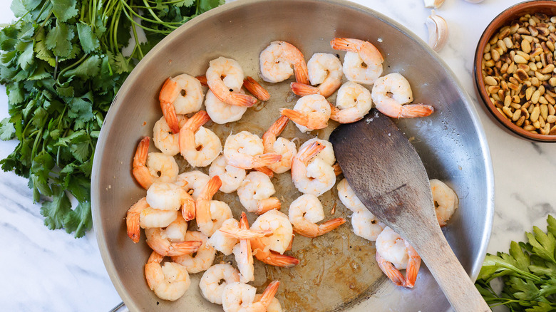 Cooked shrimp in a pan.