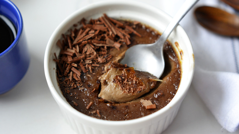 chocolate mocha crème brûlée with spoon in ramekin