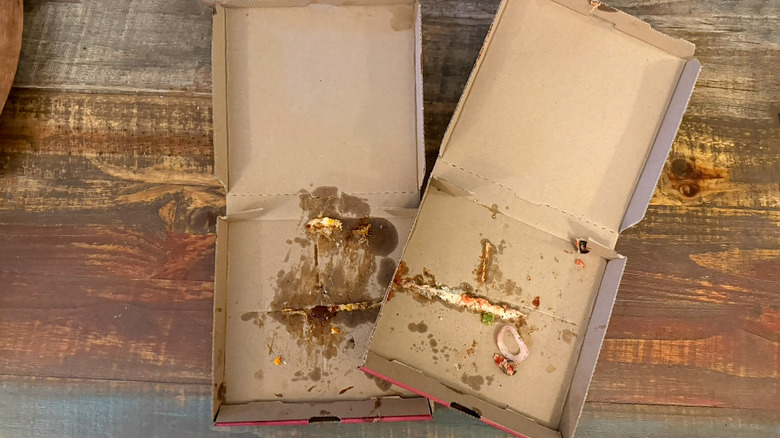 Two empty pizza boxes