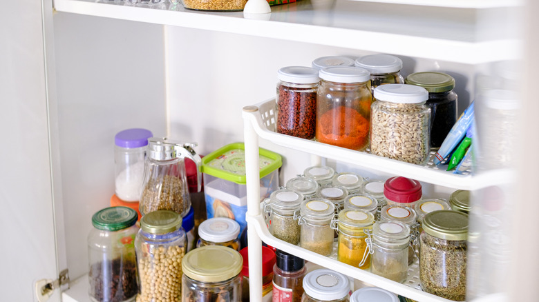 Stacking cart with spice jars inside