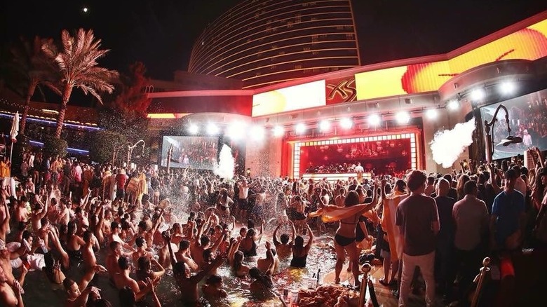 crowd dancing and partying at XS Nightclub