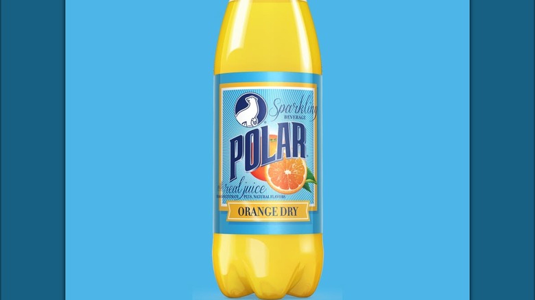 Bottle of Polar orange dry on a blue background