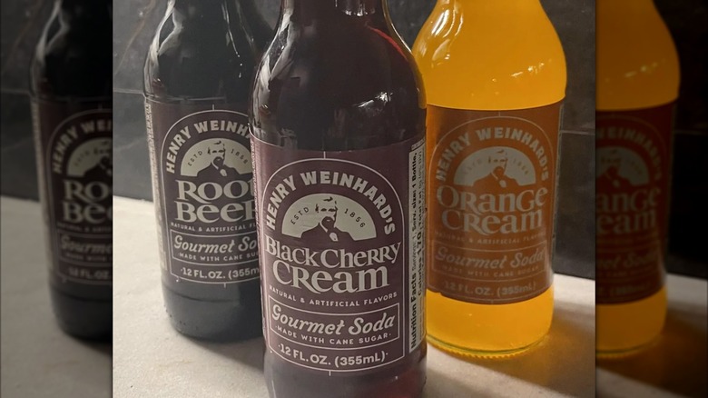 Three bottles of Henry Weinhard's sodas