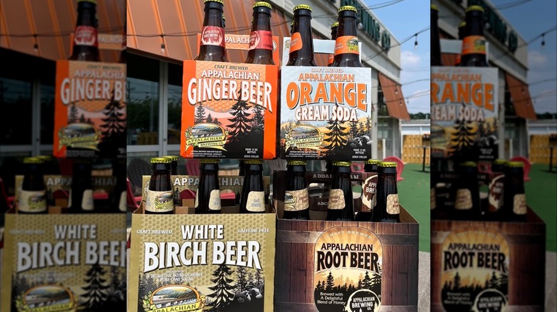 Cases of white birch beer, root beer, orange cream soda, and ginger beer from Appalachian Brewing