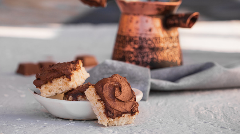 Scotcheroos in white bowl on gray table