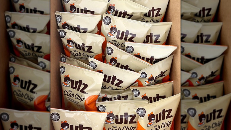 Bags of Utz crab chips in cardboard box