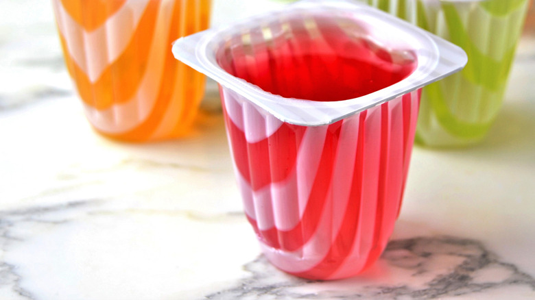 Jell-O cups on white marble counter