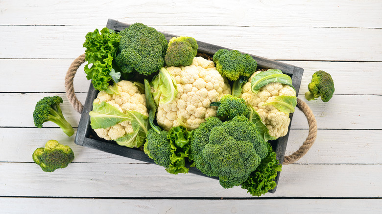 Crate of cauliflower and broccoli