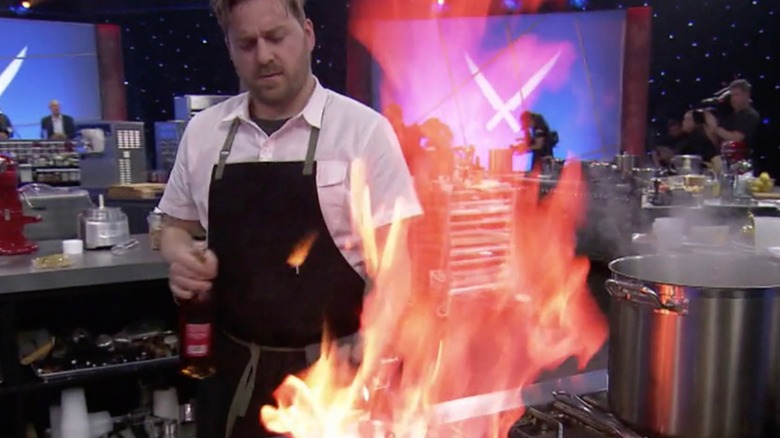 Contestant cooking on Iron Chef America