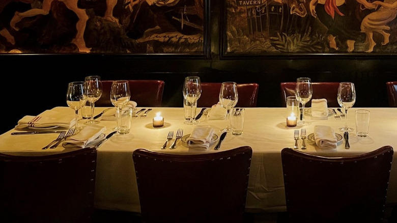 The interior of New York's Waverly Inn and its mural