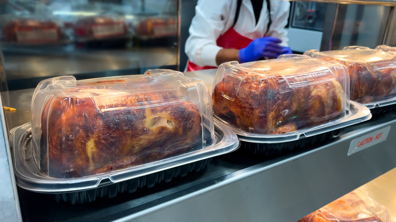 Rotisserie chickens at a supermarket.