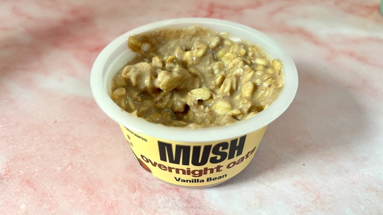 MUSH vanilla bean overnight oats on pink marble surface