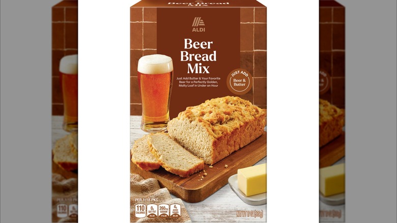 Boxed bread mix displaying a glass of beer and a loaf
