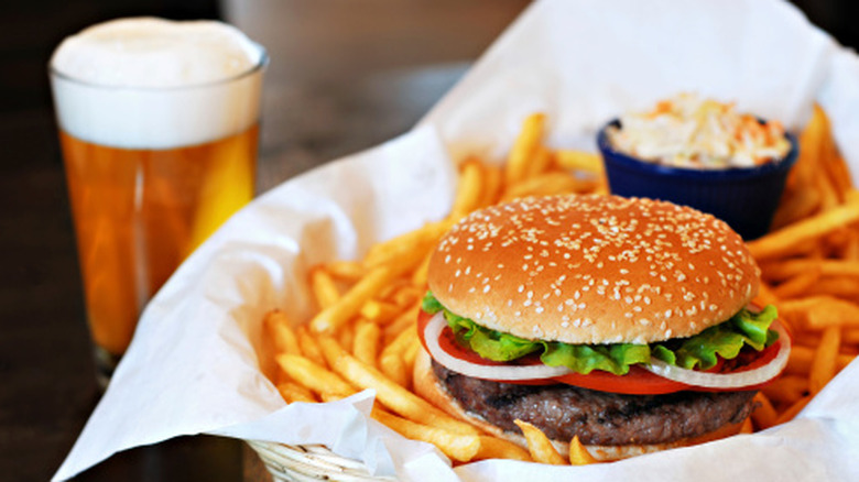 Burger with fries and a beer