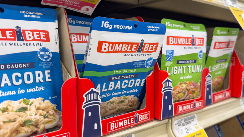 Individual tuna packets in store on shelf