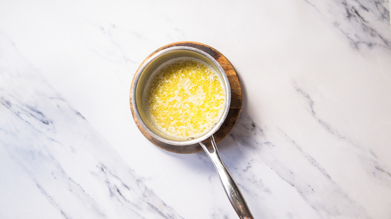 Melted butter in saucepan