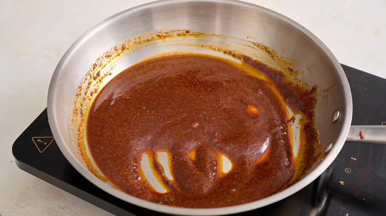 Nashville hot sauce in a skillet