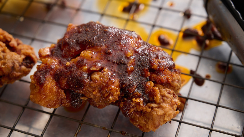 chicken coated with nashville hot sauce