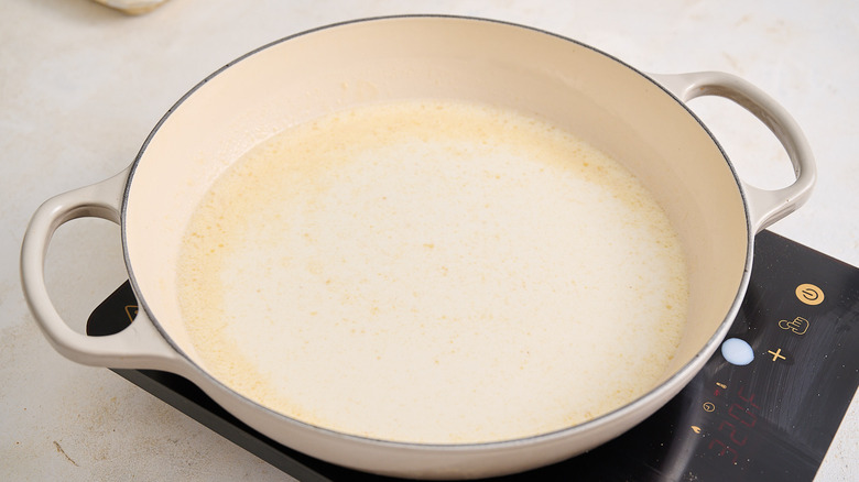 milk cooking in skillet