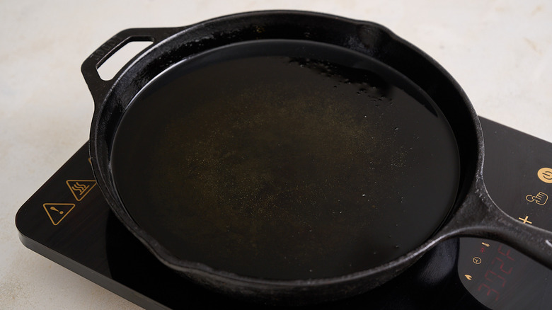 heating frying oil in a skillet