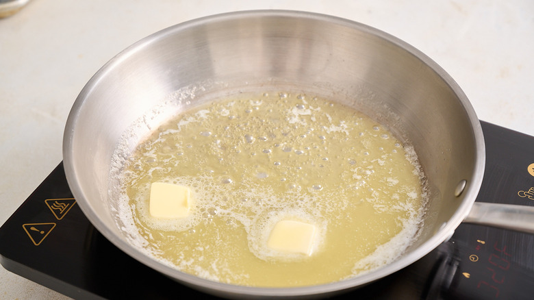 melting butter in a skillet