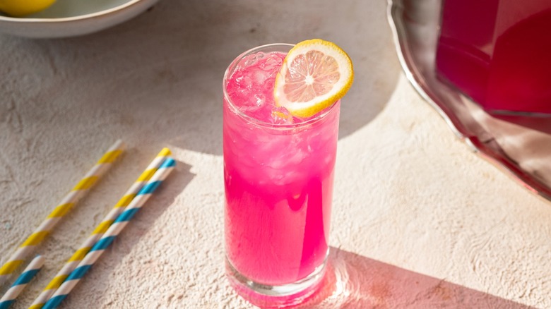 glass of iced pink lemonade