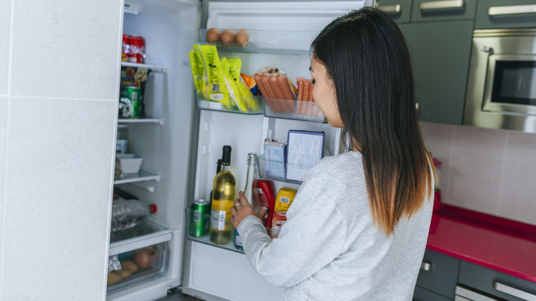 Home cook opening their refrigerator