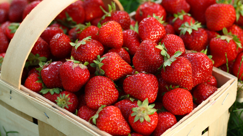 fresh strawberries in a wicker basket