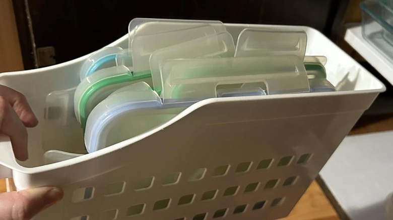 Plastic container lids stored in magazine file