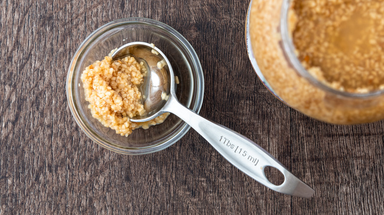 Glass jar of pre-minced garlic