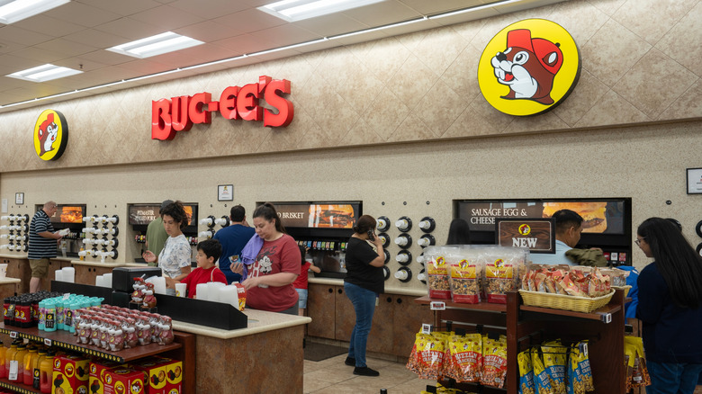 People shopping for food inside Buc-ee's
