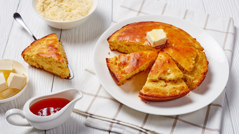 cut spider cake with syrup