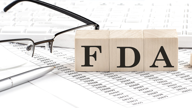 FDA in letters with keyboard and glasses