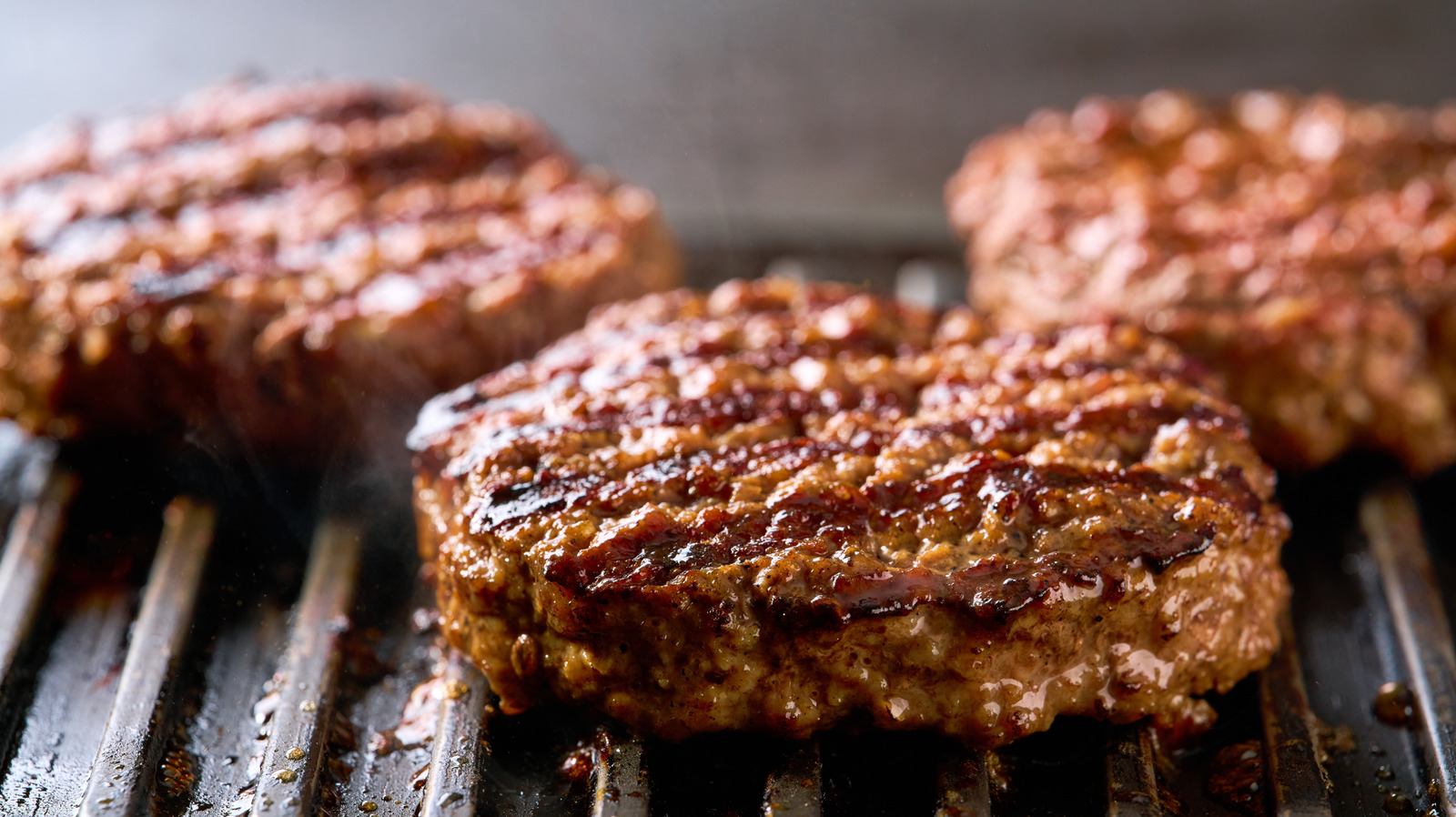 Next Time You Cook Burgers, Add 1/2 Cup Of This To Your Mixture (It's Magic Every Time) - Tasting Table